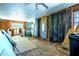 Unfinished living room with front door, exposed wall framing, and large windows at 1098 Cown Rd, Villa Rica, GA 30180