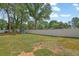 Backyard features grassy lawn with swing set and fenced yard at 5185 Twin Oak Ne Dr, Woodstock, GA 30188