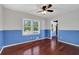 Bedroom with hardwood flooring and natural light at 5185 Twin Oak Ne Dr, Woodstock, GA 30188
