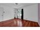 Bedroom with hardwood flooring, natural light, and closet at 5185 Twin Oak Ne Dr, Woodstock, GA 30188
