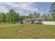 Spacious front yard showcasing the home's facade, landscaping, and inviting curb appeal at 5185 Twin Oak Ne Dr, Woodstock, GA 30188