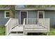 Backyard featuring a small deck and a gray home with gray siding at 2412 Forrest Park Se Rd, Atlanta, GA 30315