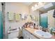 Well-lit bathroom featuring a white sink, countertop, and a framed mirror with neutral wall color at 2502 Kerry Ne Ct, Marietta, GA 30066