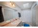 Bright bathroom features a skylight, vanity with sink, and neutral walls at 2502 Kerry Ne Ct, Marietta, GA 30066