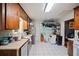 Well-lit kitchen with tile flooring, stainless steel appliances, and plenty of cabinet space provides ample storage at 2502 Kerry Ne Ct, Marietta, GA 30066