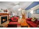 Comfortable living room with a fireplace, hardwood floors, and a cozy seating area creates a warm space at 2502 Kerry Ne Ct, Marietta, GA 30066