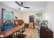 A modern office space with a large wooden desk, comfortable gaming chair, and ample natural light at 2502 Kerry Ne Ct, Marietta, GA 30066