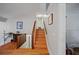 Staircase with hardwood floors and railing leads to the upper level of this well-maintained home at 2502 Kerry Ne Ct, Marietta, GA 30066