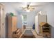 Storage room featuring two freezers, cabinet storage, a wine rack and a window at 2502 Kerry Ne Ct, Marietta, GA 30066