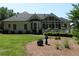 Charming backyard with a well-kept lawn and inviting patio area at 4019 Hickory Fairway Dr, Woodstock, GA 30188