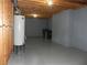 View of the unfinished basement, including the hot water heater at 4019 Hickory Fairway Dr, Woodstock, GA 30188