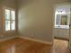 Bedroom with hardwood floors and ensuite bathroom with vanity at 4019 Hickory Fairway Dr, Woodstock, GA 30188