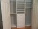 Organized closet with shelves, drawers, and hanging rods to maximize storage space at 4019 Hickory Fairway Dr, Woodstock, GA 30188