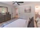 The main bedroom has an ensuite bathroom, ceiling fan, and neutral decor at 810 Parkway Se Dr, Smyrna, GA 30080