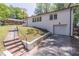 This inviting home offers an attached garage and charming curb appeal with its manicured lawn at 810 Parkway Se Dr, Smyrna, GA 30080