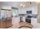 Modern kitchen featuring stainless steel appliances, white cabinets, and recessed lighting at 810 Parkway Se Dr, Smyrna, GA 30080