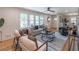 Inviting living room featuring hardwood floors, modern furnishings, and abundant natural light at 810 Parkway Se Dr, Smyrna, GA 30080