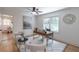 Bright home office with hardwood floors, ceiling fan, stylish decor, and natural light at 810 Parkway Se Dr, Smyrna, GA 30080