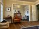 Cozy sitting room with stone fireplace, comfortable seating, and lots of natural light at 216 Slate Dr, Buford, GA 30518