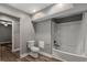 Bathroom includes a bathtub, toilet, and doorway to another room, highlighting the space's functionality at 1200 Taylor Oaks Dr, Roswell, GA 30076