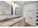 Bathroom with double sinks, granite countertops, and modern fixtures at 1200 Taylor Oaks Dr, Roswell, GA 30076