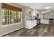 Bright kitchen featuring modern appliances, granite counters, and views into the yard at 1200 Taylor Oaks Dr, Roswell, GA 30076
