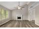 Bright living room features a fireplace and vaulted ceilings at 1200 Taylor Oaks Dr, Roswell, GA 30076