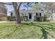 Charming single-story home with white siding and well-manicured landscaping at 2982 Ringle Rd, Brookhaven, GA 30341