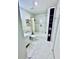 Stylish bathroom with shower-tub combo, built-in shelving and upgraded fixtures at 4437 Janice Dr, Snellville, GA 30039