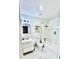Bright bathroom with marble floors, shower-tub combo and modern fixtures at 4437 Janice Dr, Snellville, GA 30039