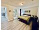The bedroom has light-toned walls and floor and en suite bath access at 4437 Janice Dr, Snellville, GA 30039