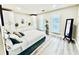 Spacious bedroom with hardwood floors, built-in cabinets, and natural lighting at 4437 Janice Dr, Snellville, GA 30039