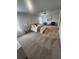 Spacious main bedroom featuring a large bed, ceiling fan, and cozy sitting area at , Union City, GA 30349