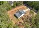 A lovely, new construction home with a densely populated treeline perimeter at 1408 Campbell Rd, Covington, GA 30014
