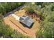 Beautiful aerial view of a one-story house with a spacious backyard and fresh landscaping at 1408 Campbell Rd, Covington, GA 30014