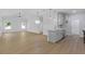 Open-concept living space featuring a modern kitchen and living room with a ceiling fan at 1408 Campbell Rd, Covington, GA 30014