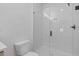 Close up of tile shower with glass door at 1408 Campbell Rd, Covington, GA 30014