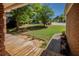 View from front porch showcases the lawn and quiet, landscaped neighborhood at 160 Vinnys Way, Covington, GA 30014