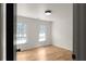 The bright room is illuminated by two windows, offering a tranquil atmosphere at 3984 Earney Rd, Woodstock, GA 30188