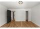 Inviting room with sleek black doors and hardwood flooring, great for relaxing at 3984 Earney Rd, Woodstock, GA 30188