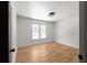 Cozy room showcases hardwood floors and a window with natural light at 3984 Earney Rd, Woodstock, GA 30188