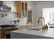 Contemporary kitchen with stainless steel appliances, marble countertops, and a central island with seating at 3984 Earney Rd, Woodstock, GA 30188