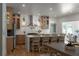 Gourmet kitchen boasts stainless steel appliances, custom cabinetry, and a central island perfect for entertaining at 3984 Earney Rd, Woodstock, GA 30188