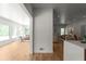Open-concept living space showcasing natural light and hardwood floors at 3984 Earney Rd, Woodstock, GA 30188
