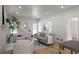 Inviting living area with a fireplace, hardwood floors, and ample seating for a comfortable and stylish home at 3984 Earney Rd, Woodstock, GA 30188