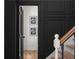 Close-up of a staircase and wainscotting design detail that adds a touch of class at 3984 Earney Rd, Woodstock, GA 30188