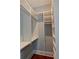 Bright walk-in closet features custom shelving and hanging rods to maximize storage at 4101 Brookview Se Dr, Atlanta, GA 30339