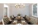 Formal dining room boasting elegant chairs, chandelier, and setting for a lavish and comfortable meal at 4101 Brookview Se Dr, Atlanta, GA 30339