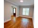 Cozy living room featuring hardwood floors, natural light, and neutral paint at 4101 Brookview Se Dr, Atlanta, GA 30339