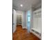 Mudroom with coat rack, bench, and doorway to a large pantry at 4101 Brookview Se Dr, Atlanta, GA 30339